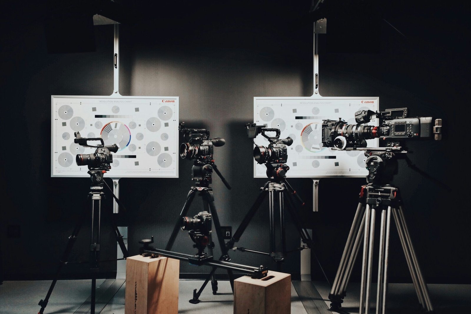 black margic pro video and DSLR cameras with tripods